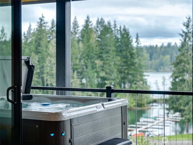 168 Lakeside Dr, Mossyrock, WA 98564 - balcony featuring a hot tub and a forest view