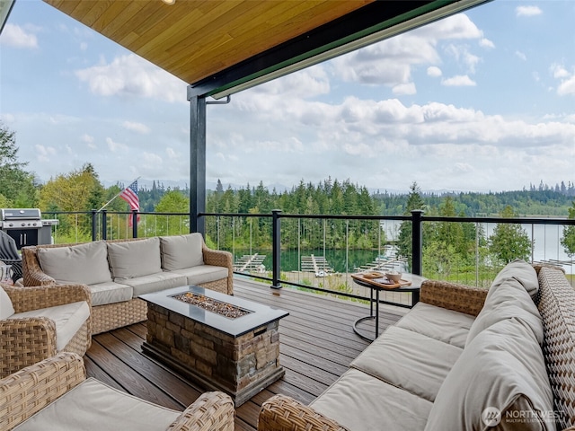 168 Lakeside Dr, Mossyrock, WA 98564 - wooden deck with an outdoor living space with a fire pit, a water view, and a grill