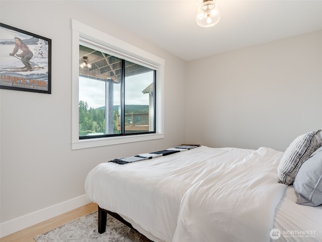 168 Lakeside Dr, Mossyrock, WA 98564 - bedroom with wood finished floors and baseboards