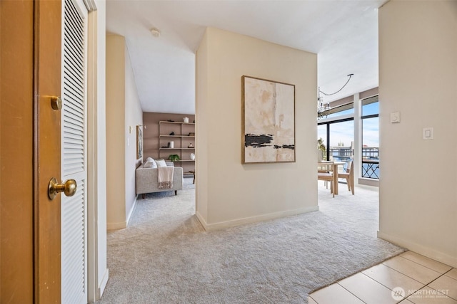 2360 43rd Ave E Unit 404, Seattle, WA 98112 - corridor with carpet and a chandelier