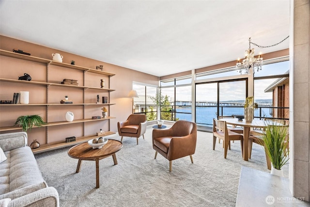 2360 43rd Ave E Unit 404, Seattle, WA 98112 - living room featuring a chandelier, expansive windows, carpet, and a water view