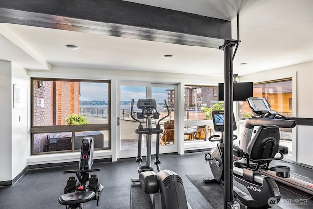 2360 43rd Ave E Unit 404, Seattle, WA 98112 - exercise room with baseboards