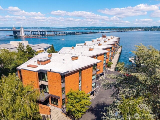 2360 43rd Ave E Unit 404, Seattle, WA 98112 - drone / aerial view of a notable bridge and a nearby body of water