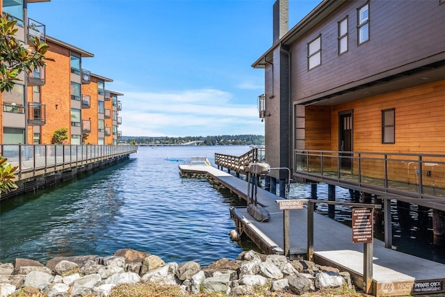 2360 43rd Ave E Unit 404, Seattle, WA 98112 - dock area featuring a water view