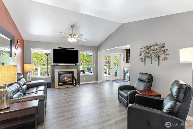 13233 59th Ave W, Edmonds, WA 98026 - living room with healthy amount of natural light, wood finished floors, french doors, and vaulted ceiling