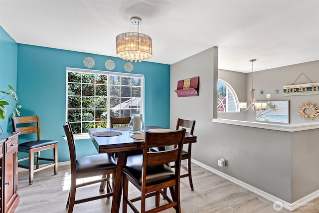 13233 59th Ave W, Edmonds, WA 98026 - dining room featuring a chandelier and light wood-style flooring
