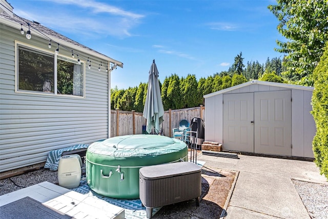 13233 59th Ave W, Edmonds, WA 98026 - view of patio / terrace featuring a storage shed