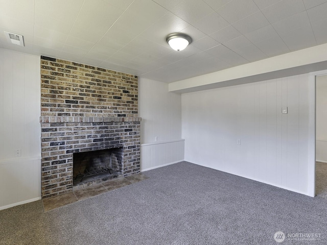 1501 154th St E, Tacoma, WA 98445 - unfurnished living room featuring carpet floors and a fireplace
