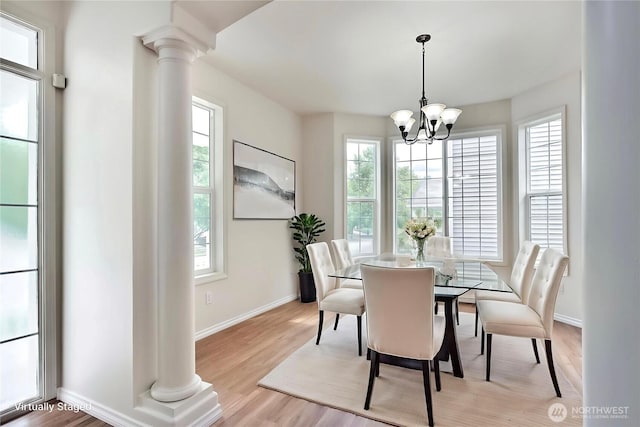 8415 15th Ave SE, Olympia, WA 98513 - dining space featuring decorative columns and plenty of natural light