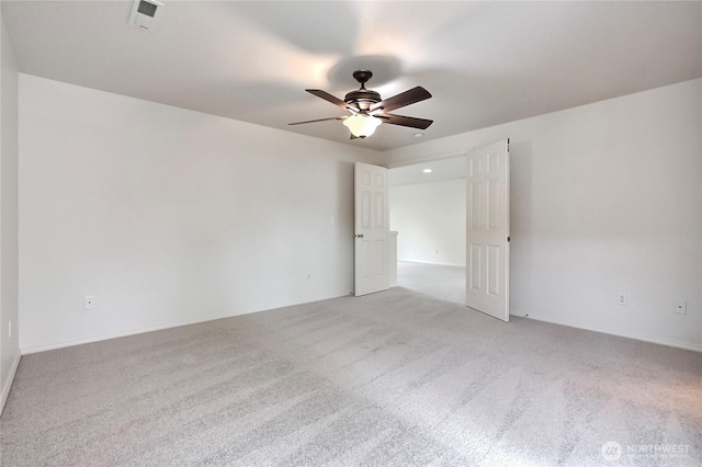 8415 15th Ave SE, Olympia, WA 98513 - unfurnished room with a ceiling fan and light carpet
