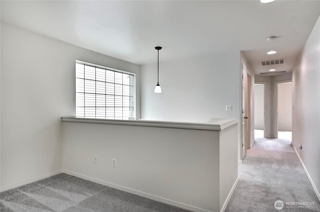 8415 15th Ave SE, Olympia, WA 98513 - hall featuring carpet flooring, recessed lighting, and an upstairs landing