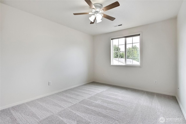 8415 15th Ave SE, Olympia, WA 98513 - spare room featuring light carpet and ceiling fan