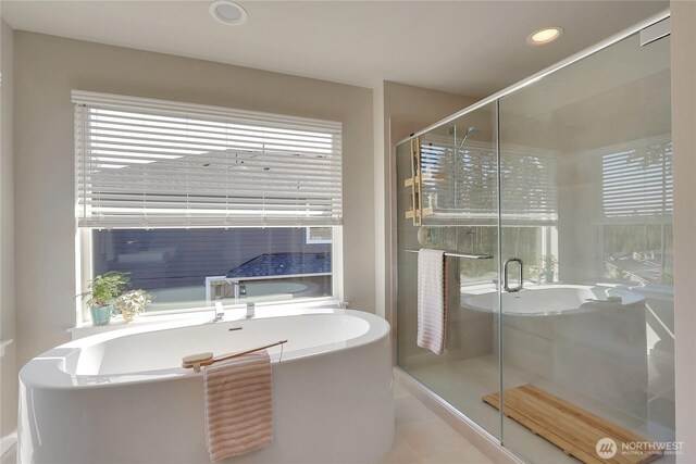 4615 SW Olivine Dr SW, Port Orchard, WA 98367 - full bath featuring a garden tub, healthy amount of natural light, a stall shower, and recessed lighting