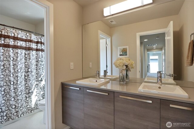 4615 SW Olivine Dr SW, Port Orchard, WA 98367 - full bathroom featuring double vanity and toilet