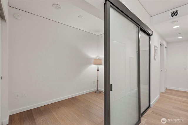 450 S Main St Unit 505, Seattle, WA 98101 - hall with baseboards and light wood-style floors