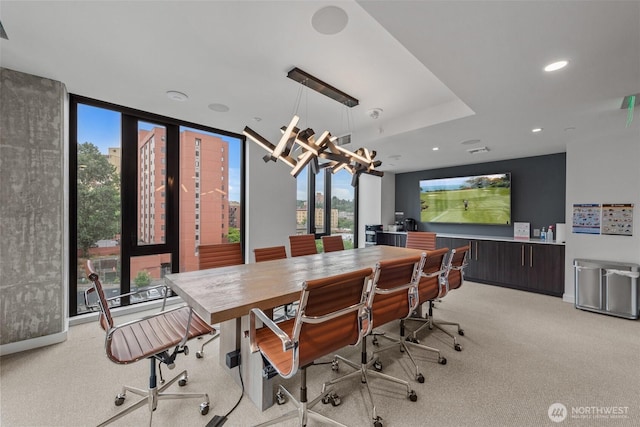 450 S Main St Unit 505, Seattle, WA 98101 - dining space featuring a chandelier, light colored carpet, healthy amount of natural light, and recessed lighting