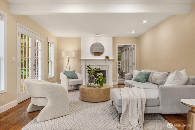 7089 NE Bay Hill Rd, Bainbridge Island, WA 98110 - living area featuring recessed lighting, wood finished floors, a fireplace, and beamed ceiling