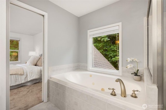 7089 NE Bay Hill Rd, Bainbridge Island, WA 98110 - ensuite bathroom featuring a whirlpool tub and plenty of natural light