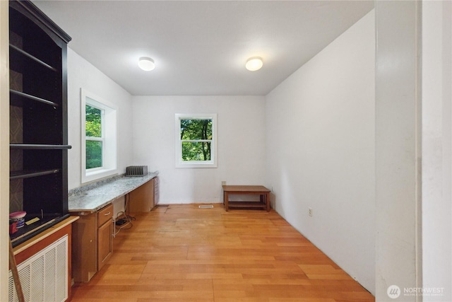 7554 Guemes Island Rd, Anacortes, WA 98221 - unfurnished office featuring light wood-style flooring and built in desk