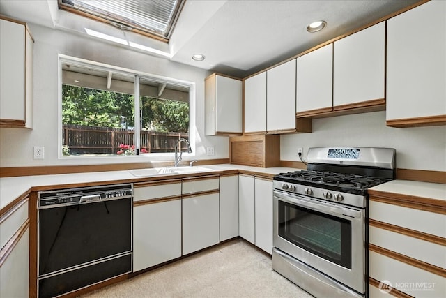 15023 Densmore Ave N, Shoreline, WA 98133 - kitchen featuring stainless steel range with gas stovetop, black dishwasher, light countertops, and recessed lighting