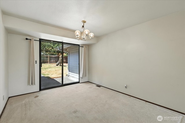 15023 Densmore Ave N, Shoreline, WA 98133 - empty room with a chandelier and carpet