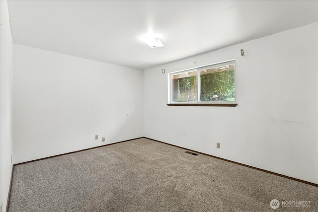 15023 Densmore Ave N, Shoreline, WA 98133 - unfurnished room with carpet floors and baseboards