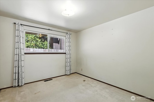 15023 Densmore Ave N, Shoreline, WA 98133 - spare room with baseboards and carpet floors