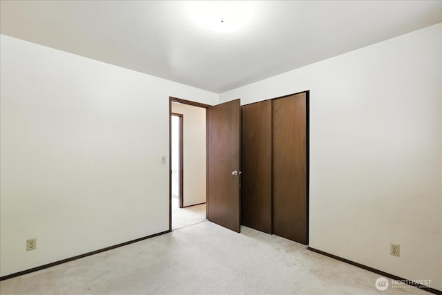 15023 Densmore Ave N, Shoreline, WA 98133 - unfurnished bedroom with light colored carpet and a closet