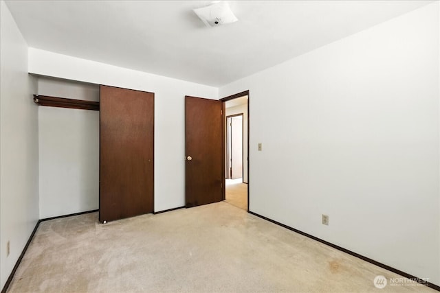 15023 Densmore Ave N, Shoreline, WA 98133 - unfurnished bedroom featuring light colored carpet and a closet