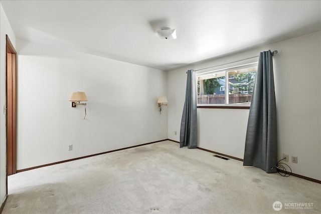 15023 Densmore Ave N, Shoreline, WA 98133 - carpeted empty room featuring baseboards