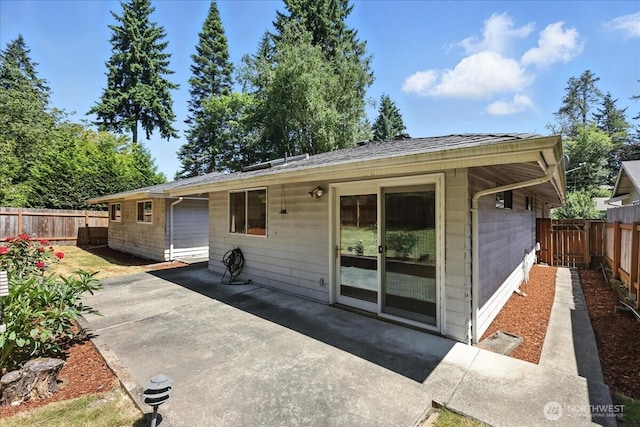 15023 Densmore Ave N, Shoreline, WA 98133 - view of front of property featuring a patio and a fenced backyard