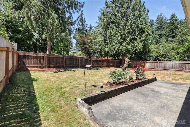 15023 Densmore Ave N, Shoreline, WA 98133 - fenced backyard with a patio area