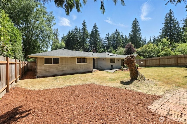 15023 Densmore Ave N, Shoreline, WA 98133 - rear view of house featuring a fenced backyard and a patio area