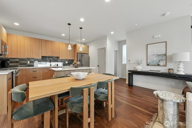 4119 Wallingford Ave N Unit C, Seattle, WA 98103 - dining room with dark wood-type flooring and recessed lighting