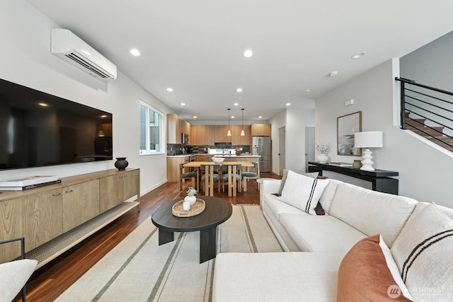 4119 Wallingford Ave N Unit C, Seattle, WA 98103 - living area with a wall mounted air conditioner, light wood-type flooring, and recessed lighting