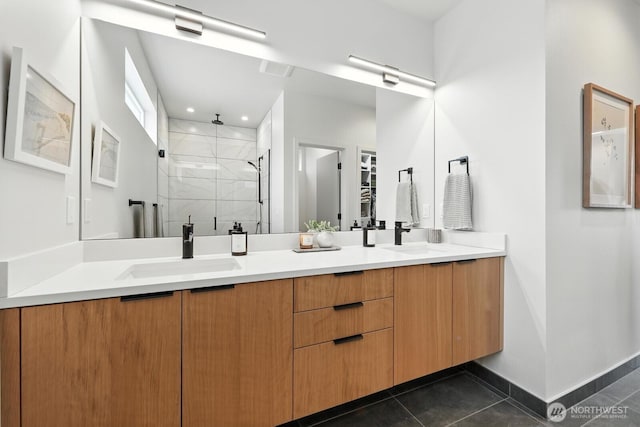 4119 Wallingford Ave N Unit C, Seattle, WA 98103 - bathroom featuring double vanity, a marble finish shower, and tile patterned floors