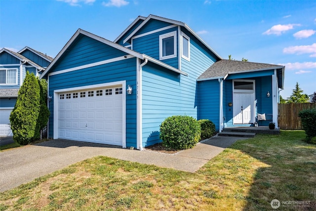 6713 135th E, Puyallup, WA 98373 - view of front of property featuring driveway and an attached garage