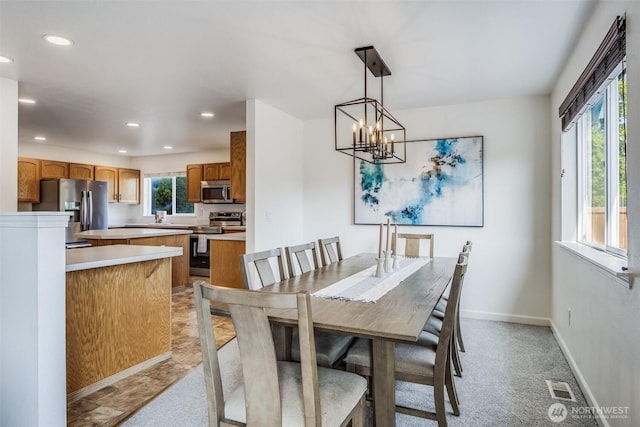 6713 135th E, Puyallup, WA 98373 - dining room with recessed lighting and a chandelier