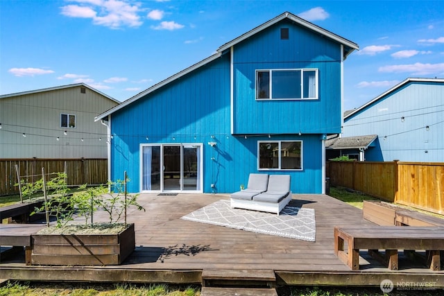 6713 135th E, Puyallup, WA 98373 - rear view of house featuring a fenced backyard and a deck