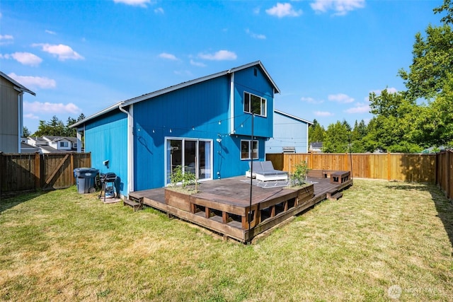 6713 135th E, Puyallup, WA 98373 - back of house featuring a deck and a fenced backyard