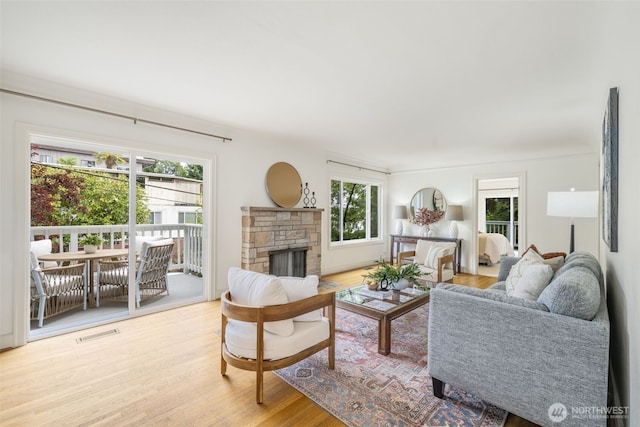 1222 6th Ave N, Seattle, WA 98109 - living area featuring wood finished floors and a fireplace