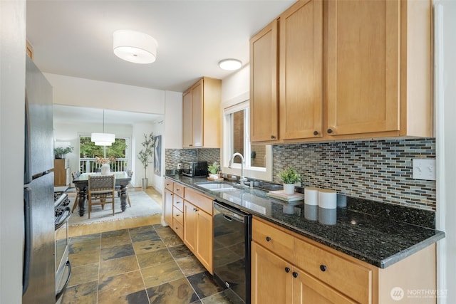 1222 6th Ave N, Seattle, WA 98109 - kitchen featuring appliances with stainless steel finishes, tasteful backsplash, dark stone finish flooring, dark stone countertops, and decorative light fixtures