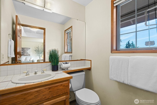 16909 NE 37th Pl, Bellevue, WA 98008 - bathroom with vanity and backsplash