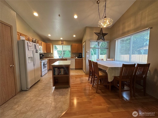 15015 105th Ave SE, Yelm, WA 98597 - kitchen featuring white appliances, light countertops, open shelves, recessed lighting, and a kitchen island