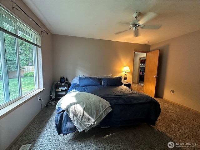 15015 105th Ave SE, Yelm, WA 98597 - bedroom with multiple windows, carpet flooring, and ceiling fan