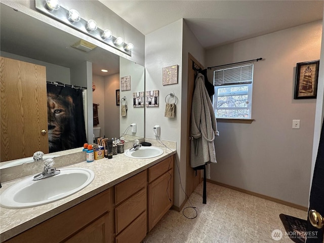 15015 105th Ave SE, Yelm, WA 98597 - full bath with double vanity and baseboards