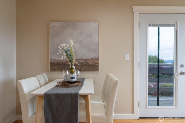 3918 Commencement Bay Dr, Tacoma, WA 98407 - dining area featuring baseboards