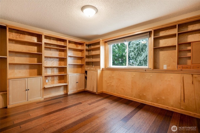 3918 Commencement Bay Dr, Tacoma, WA 98407 - empty room with hardwood / wood-style floors and a textured ceiling