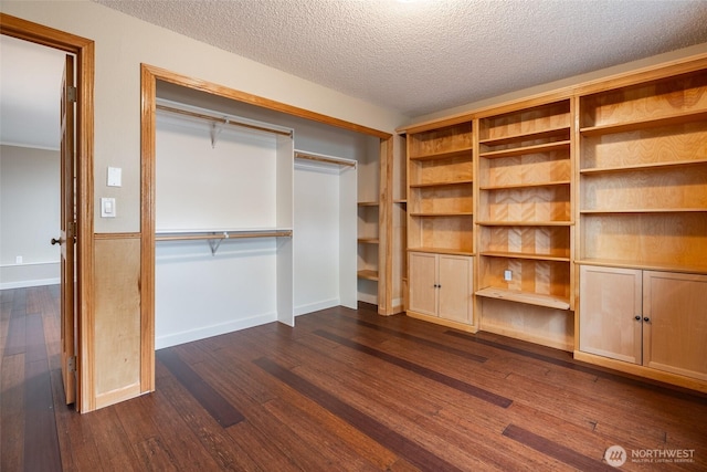 3918 Commencement Bay Dr, Tacoma, WA 98407 - unfurnished bedroom featuring dark wood finished floors and a textured ceiling