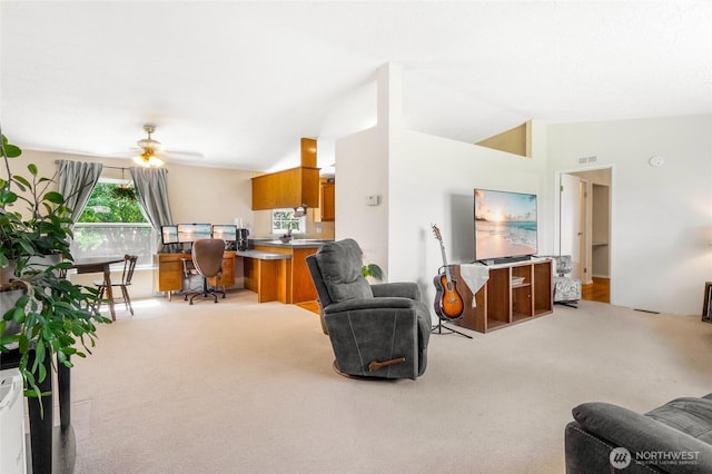 101 E 8th St, Lind, WA 99341 - living room featuring light carpet, a ceiling fan, and vaulted ceiling